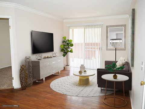 a living room with a couch and a television